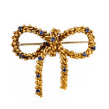 Sapphire Bow 18k Yellow Gold Brooch by Tiffany & Co., circa 1970s