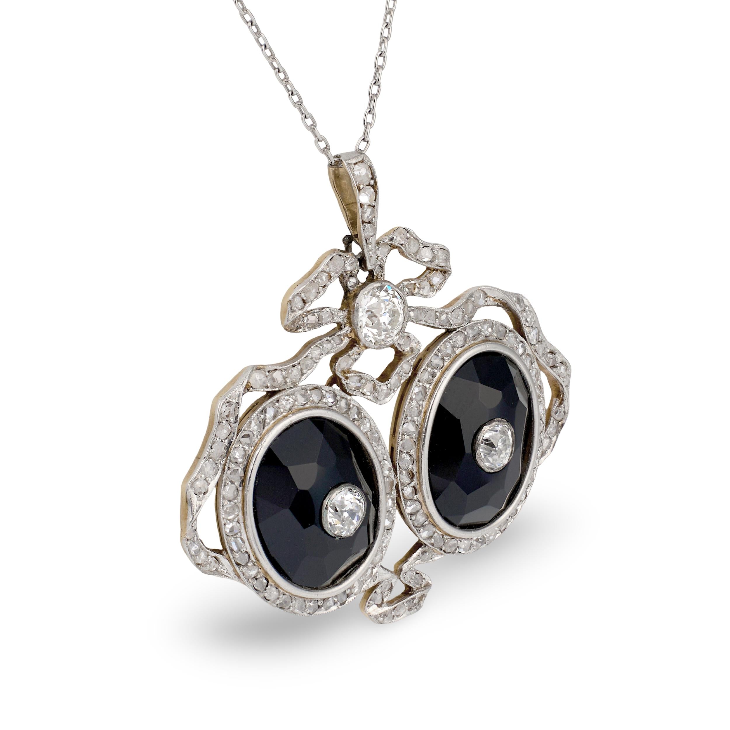 Edwardian Diamond and Onyx Platinum and 18k Yellow Gold Pendant, circa 1900s