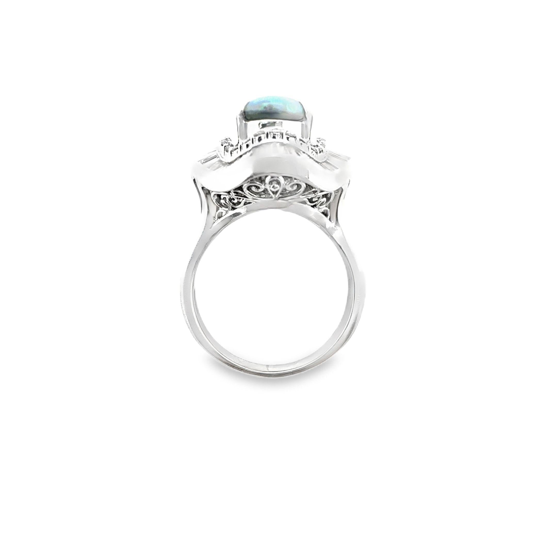 MID-CENTURY PLATINUM BLACK OPAL AND DIAMOND BALLERINA STYLE RING