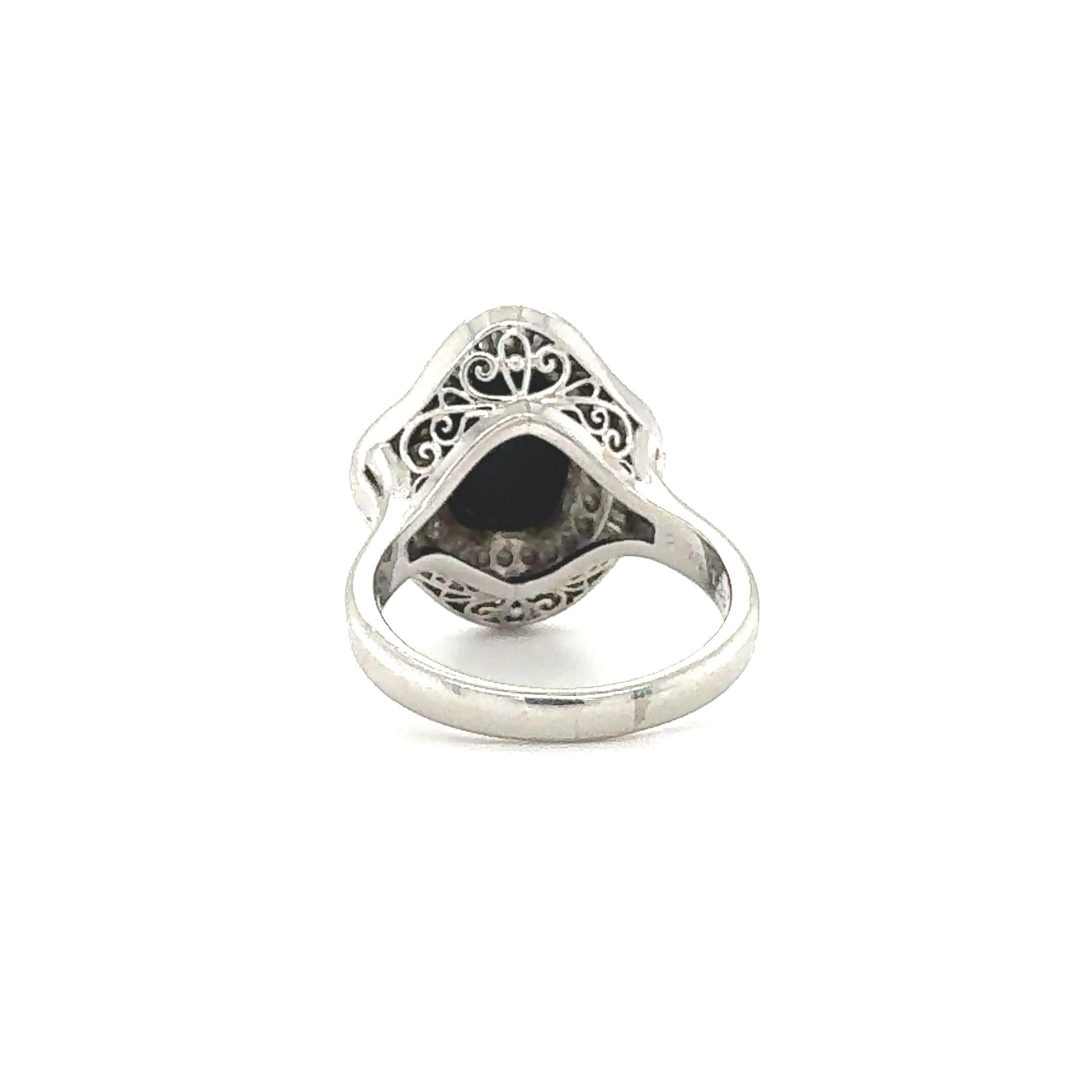 MID-CENTURY PLATINUM BLACK OPAL AND DIAMOND BALLERINA STYLE RING