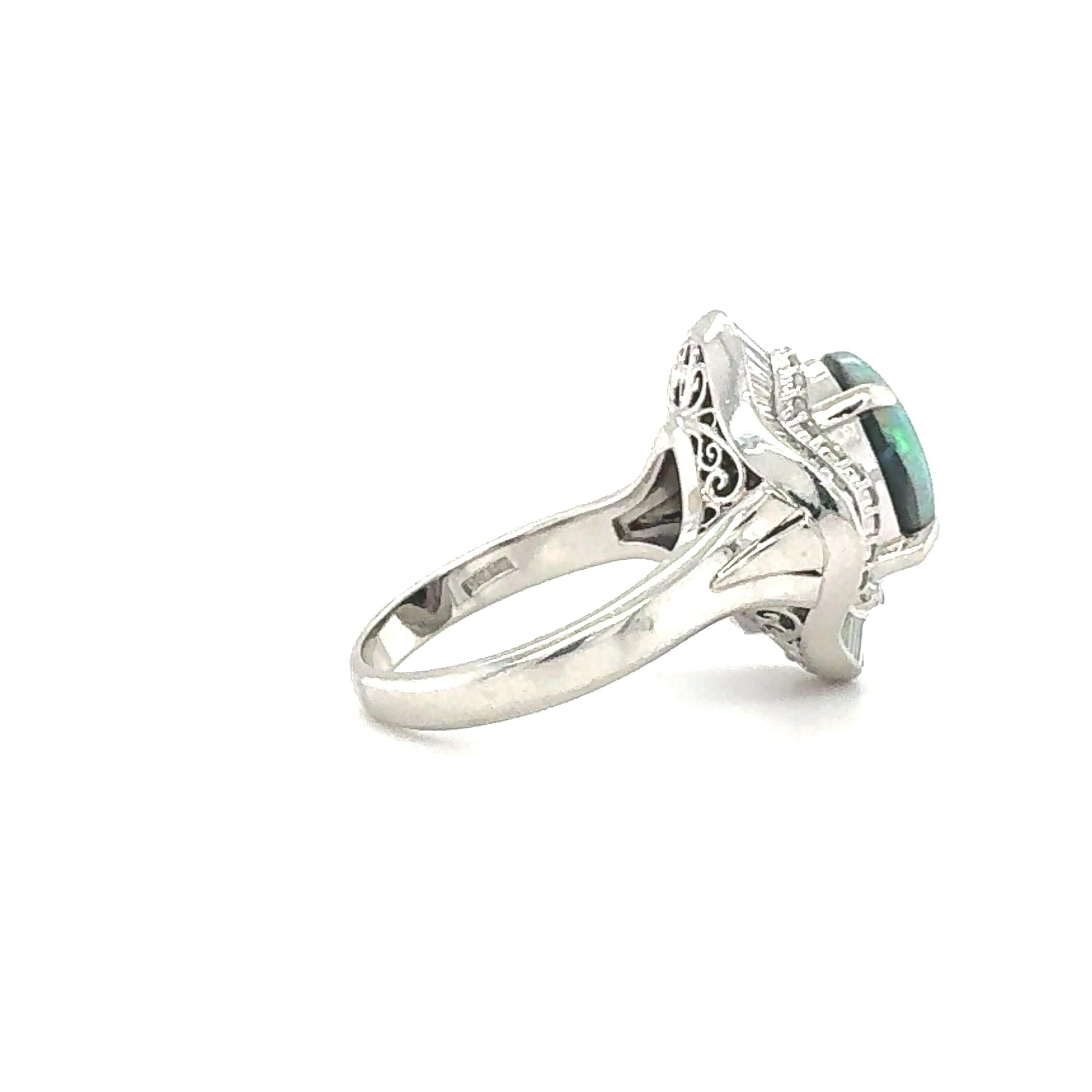 MID-CENTURY PLATINUM BLACK OPAL AND DIAMOND BALLERINA STYLE RING